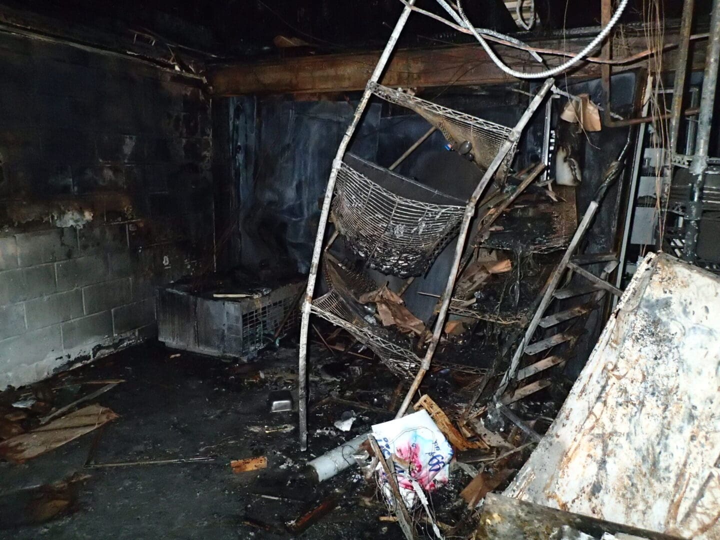 A room that has been burned and is in the middle of it.