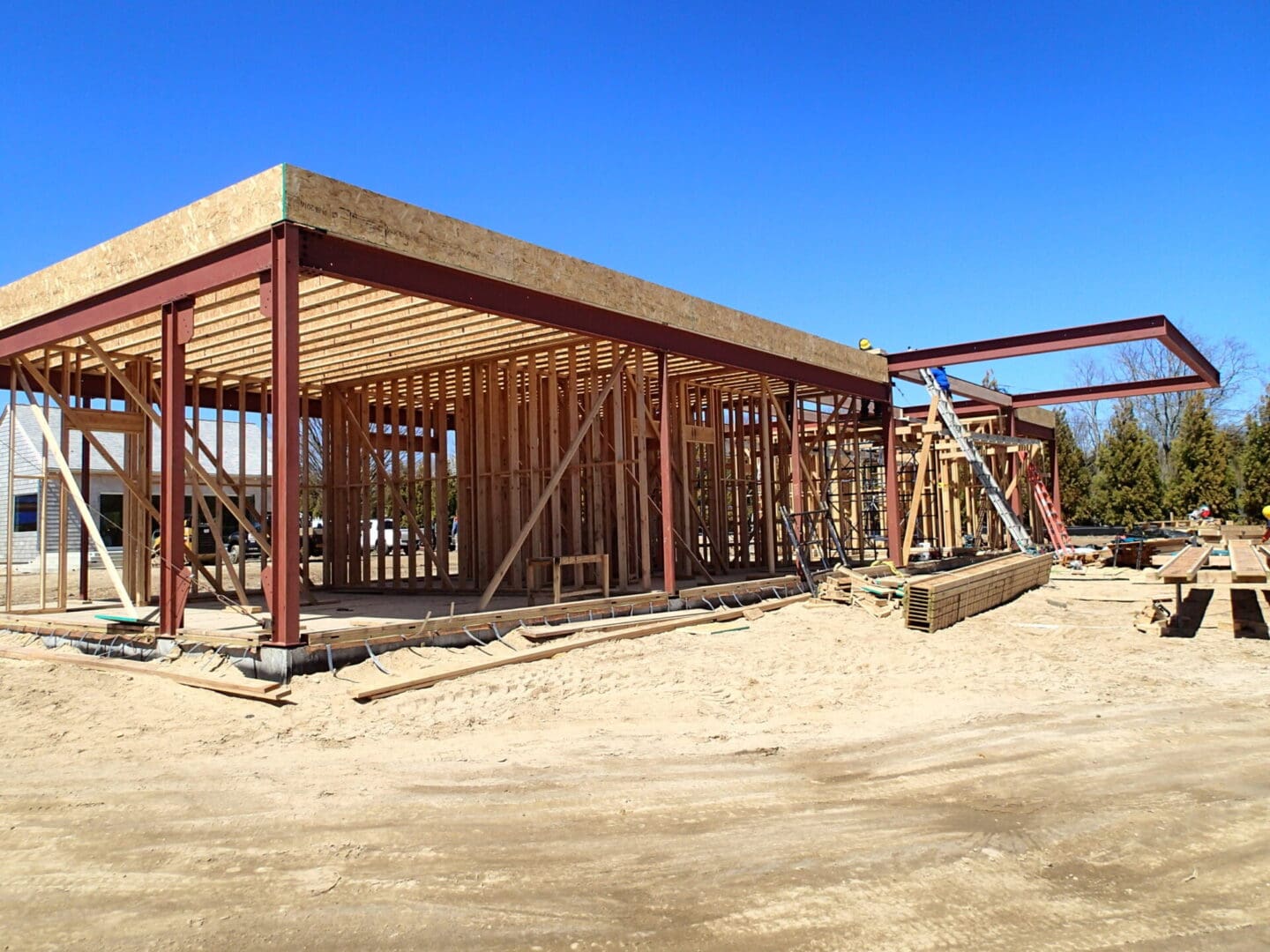 A building under construction with some wood framing.