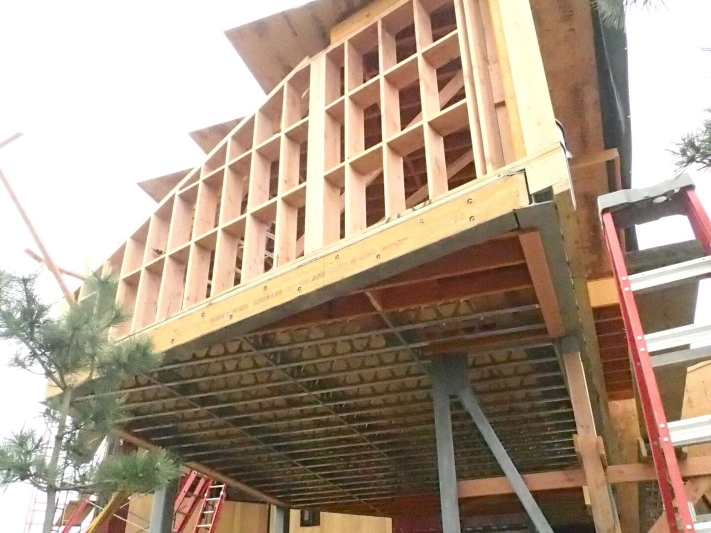 A building under construction with wood framing.